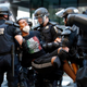A demonstrator being taken into custody by police near the White House on June 1, 2020.